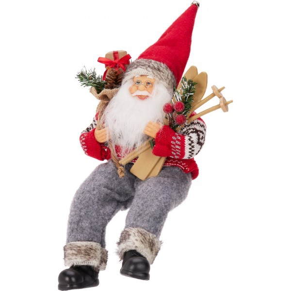 Sedící Santa s pytlem dárků a lyžemi 30 cm